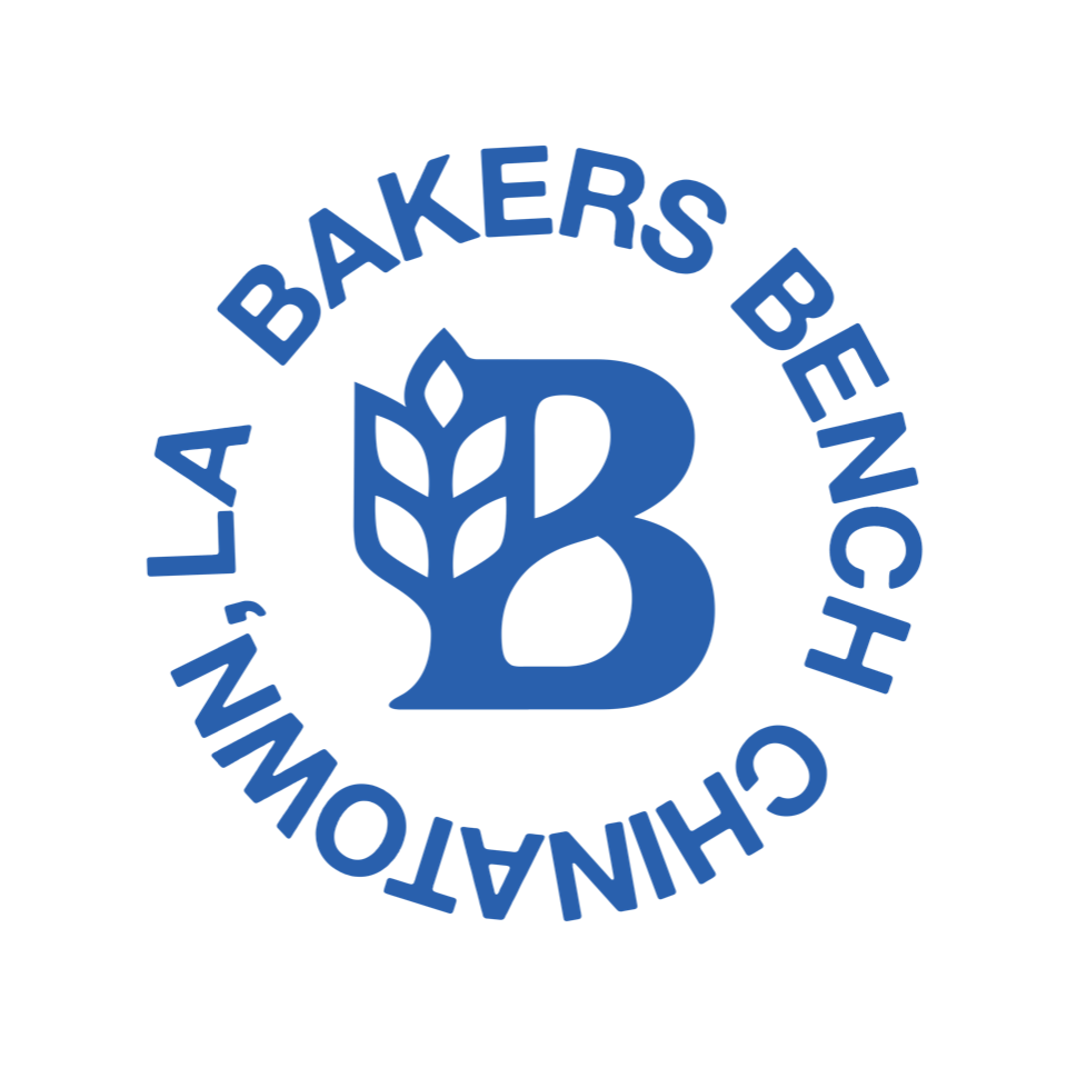 The Bakers Bench logo, which is a stylized uppercase B surrounded by the text, “LA Bakers Bench. Chinatown, LA”
